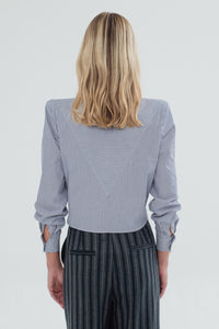 BLUSA OMICRON RAYA NEGRA Y BLANCA